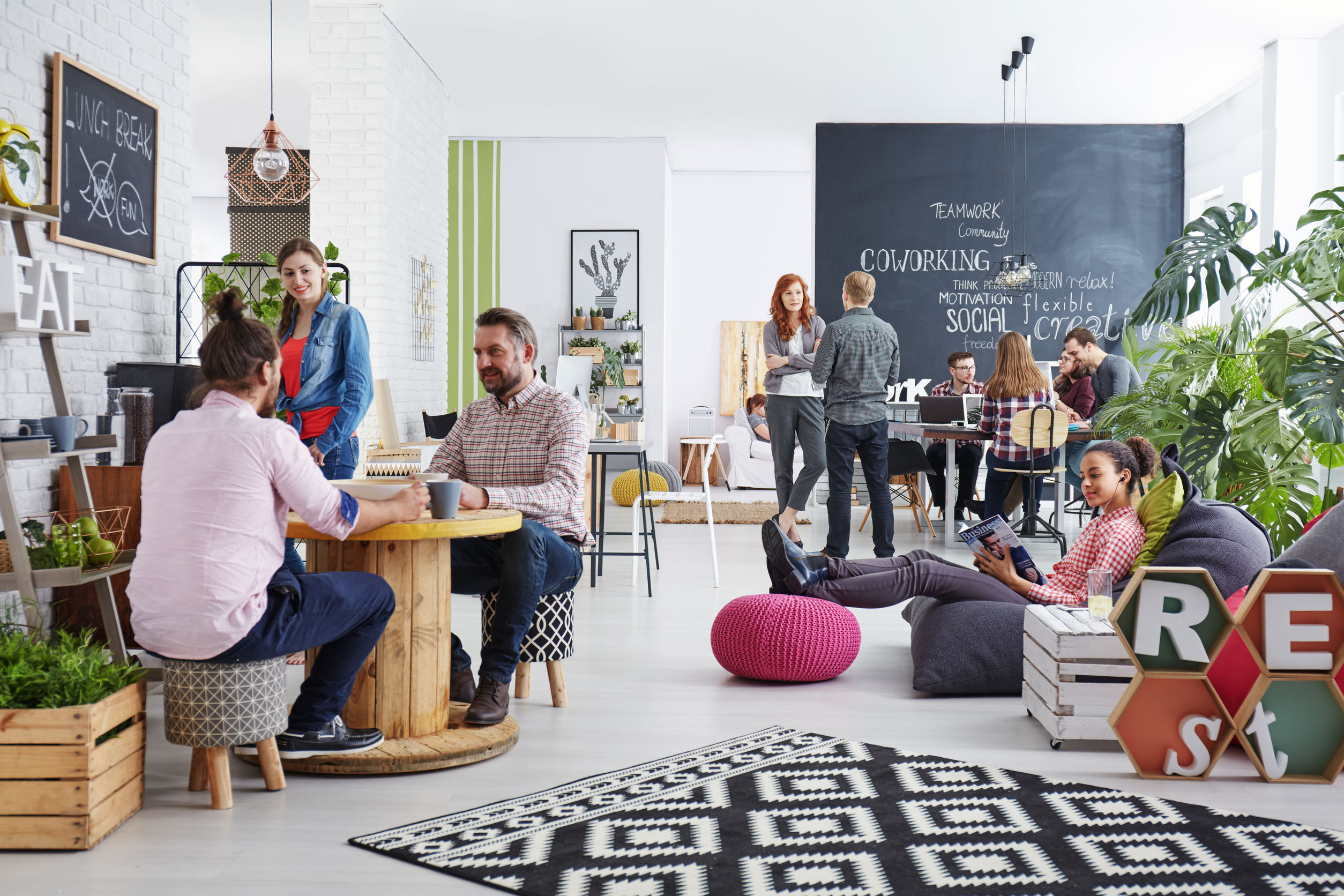 people working in modern agency relaxing during lunch break - modern office